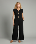 Christi wijde-pijpen jumpsuit met knopsluiting voor vrouwen.