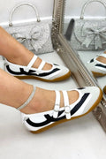 Comfortabele Mary Jane Eclipse Strap Trainers in wit met criss-cross banden en metalen gespen.