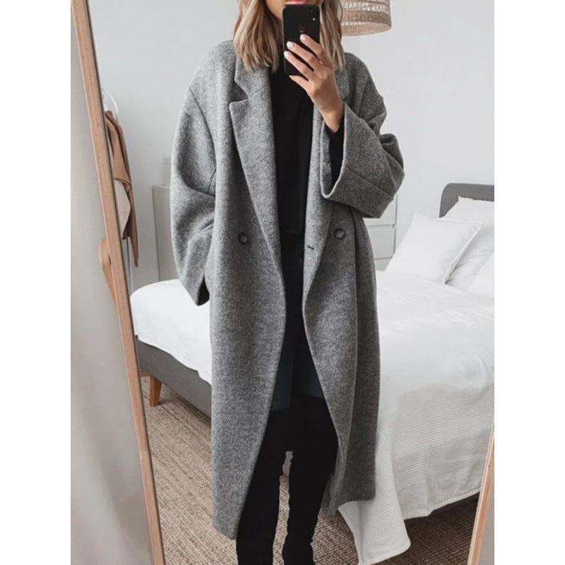 Stijlvolle oversized damesjas met notched lapels en dubbele knopen.