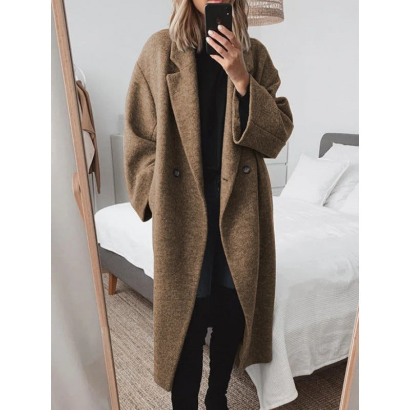 Stijlvolle oversized damesjas met notched lapels en dubbele knopen. 3