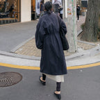 Stijlvol oversized damesjas met ballonmouwen en trekkoord taille. 3