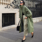 Stijlvol oversized damesjas met ballonmouwen en trekkoord taille. 5