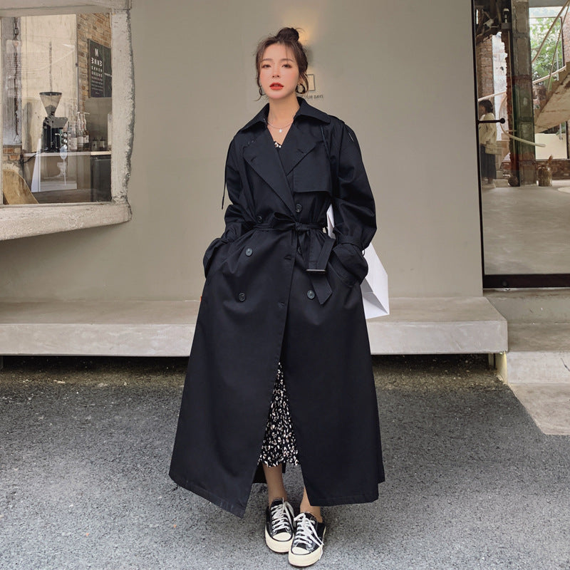Dames stijlvolle oversized trenchcoat met dubbele knoopsluiting en stormflap
