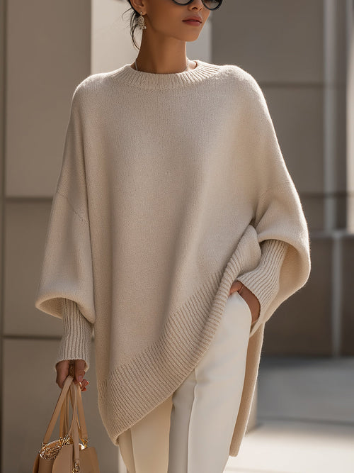 Dames poncho-strickpullover met fledermausärmeln in elegante stijl.