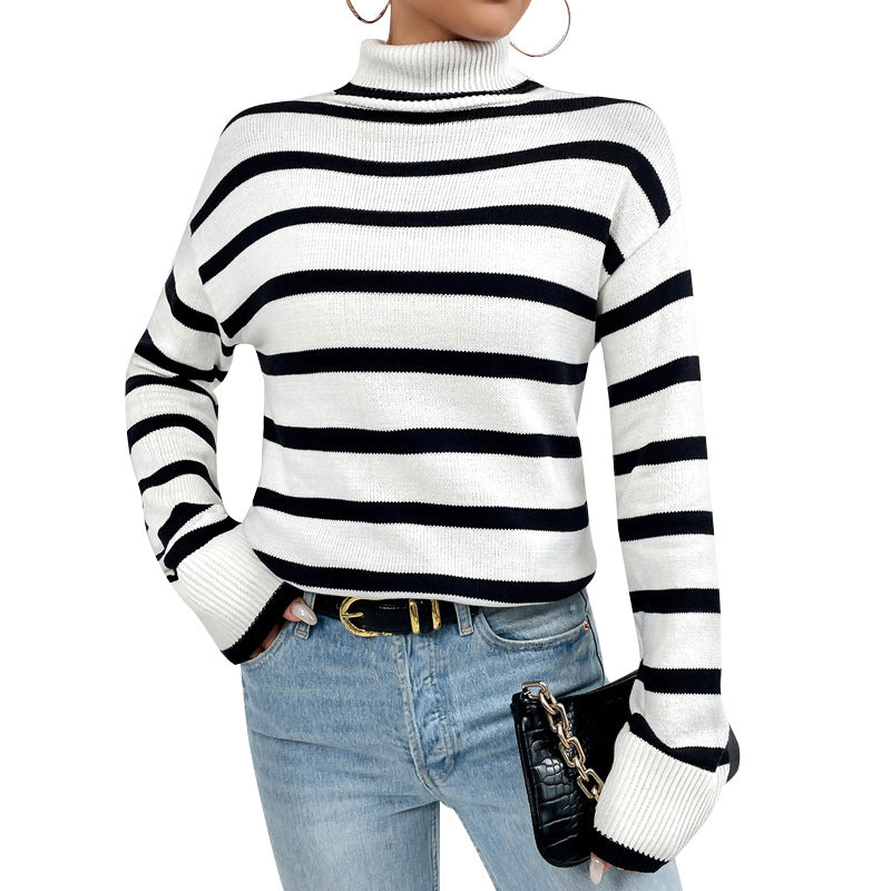 Stijlvolle dames pullover met hoog gesloten kraag en gestreept patroon.