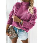 Dames pullover met lange mouwen en rolkraag in magenta kleur.