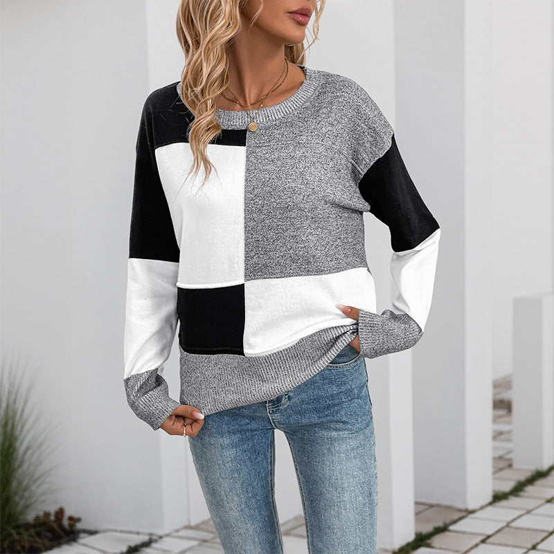Stijlvolle dames pullover met lange mouwen en kleurblokdesign.