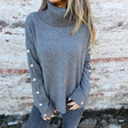 Elegante dames rollkragenpullover met knoopdetails, perfect voor elke gelegenheid. 2