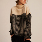 Dames rollkragenpullover met visgraatpatroon in stijlvol ontwerp.