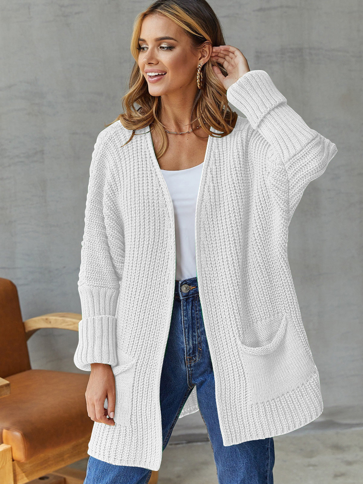 Dames strickjacke met praktische zakken in verschillende kleuren. 10