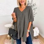 Dames strickponcho met V-hals in verschillende kleuren. 7