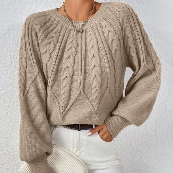 Dames strickpullover met zopfpatroon in beige kleur.