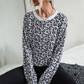 Elegante dames strickpullover met leopardenpatroon, perfect voor elke gelegenheid.