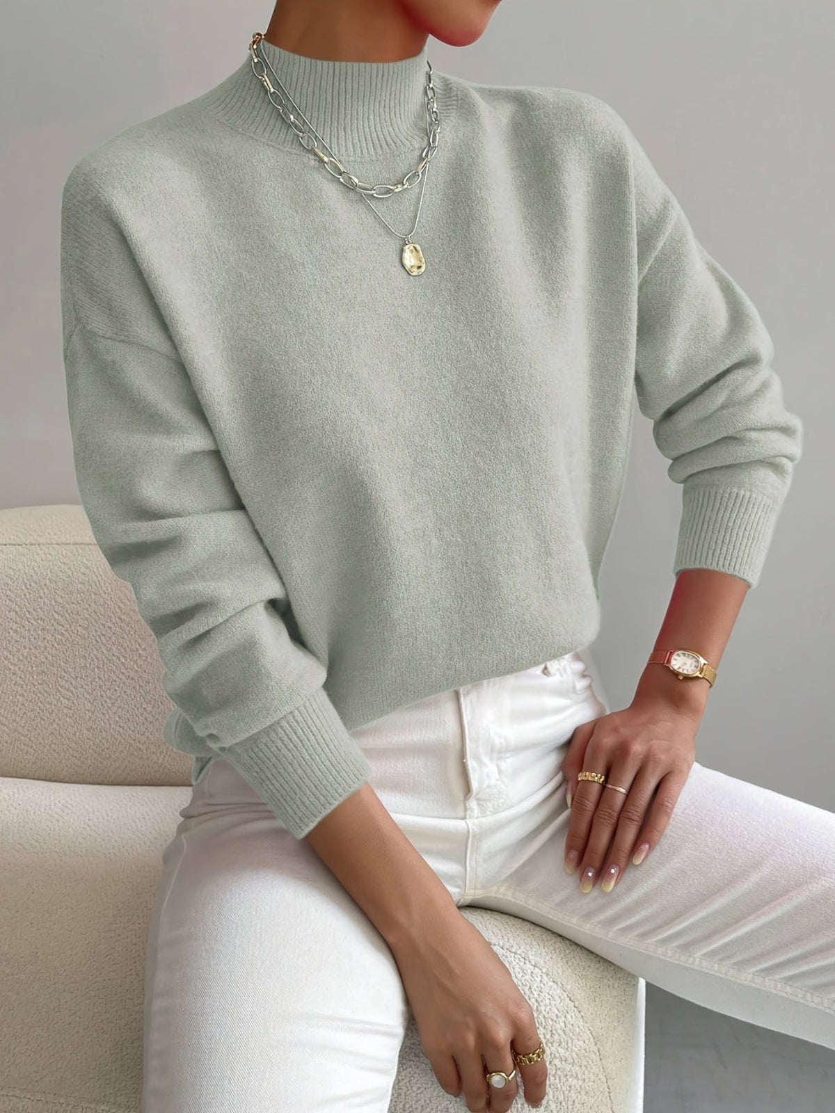 Dames strickpullover met staande kraag in verschillende kleuren.