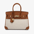 Handtas met canvas en leren details in verschillende kleuren