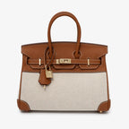 Handtas met canvas en leren details in verschillende kleuren