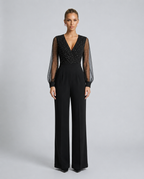 Ellen jumpsuit met pailletten en mesh mouwen voor speciale gelegenheden.