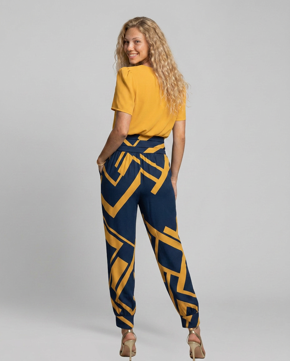 Erma V-Neck Jumpsuit met elastische taille in zwart, groen, blauw en geel. 10