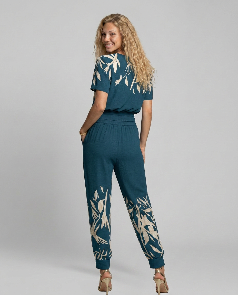 Erma V-Neck Jumpsuit met elastische taille in zwart, groen, blauw en geel. 7