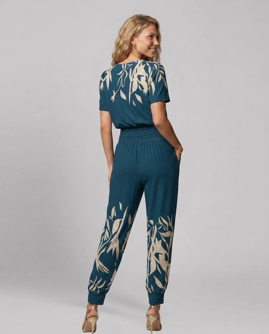 Erma V-Neck Jumpsuit met elastische taille in zwart, groen, blauw en geel. 8