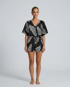 Merle romper met V-hals en abstracte print voor dames. 6