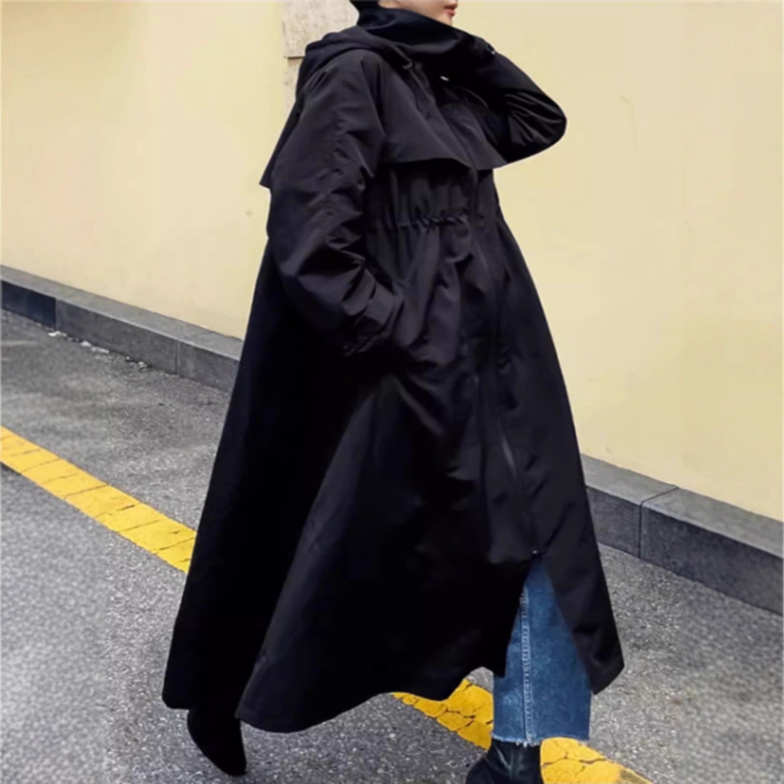 Vrouwen waterafstotende oversized regenjas met capuchon en A-lijn silhouet 2