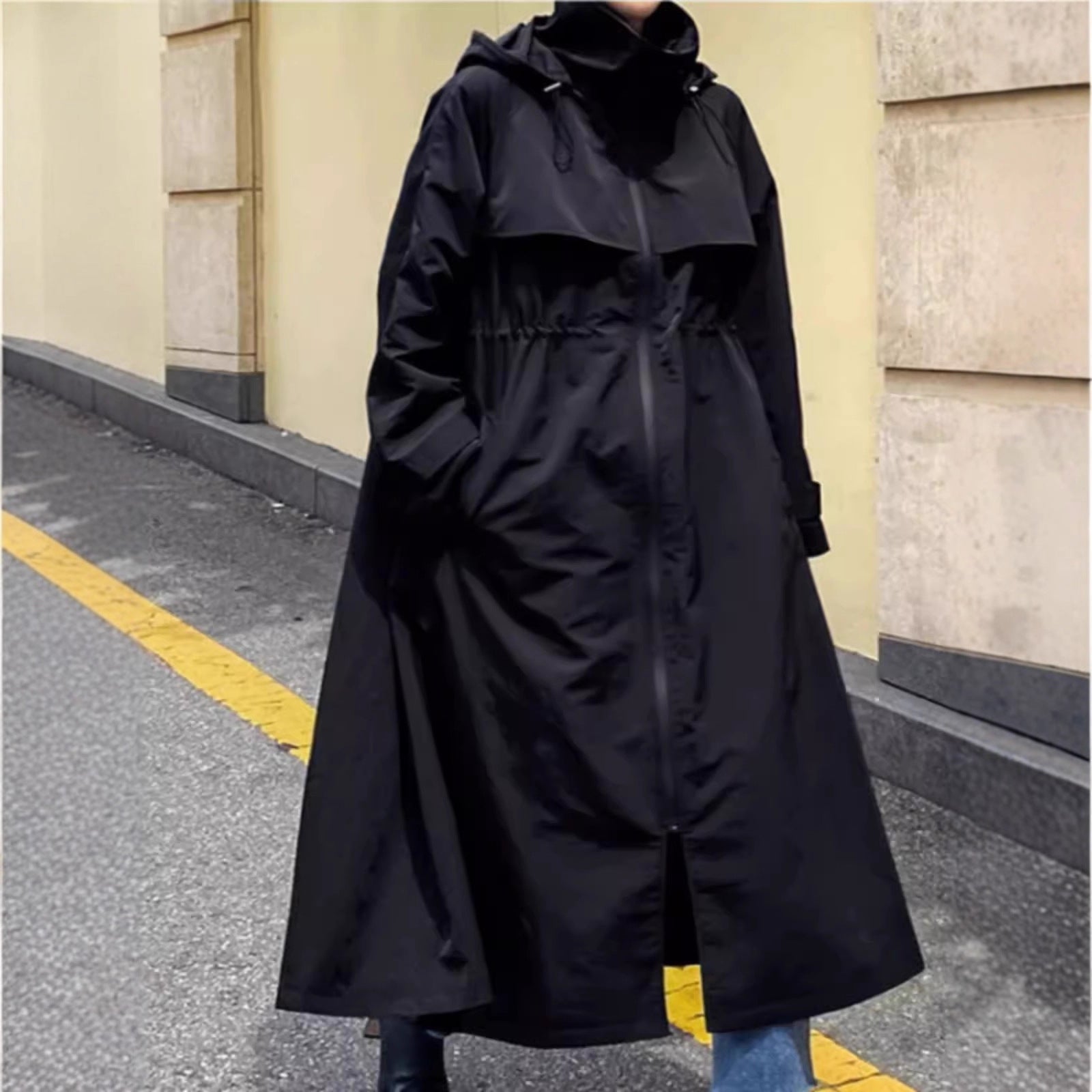 Vrouwen waterafstotende oversized regenjas met capuchon en A-lijn silhouet 4