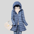 Stijlvolle puffer winterjas met rits en zijzakken voor dames.